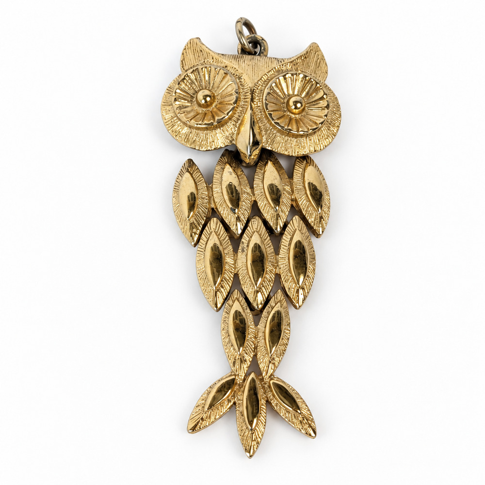 Avon gold-tone articulated owl pendant 1974 Catalog
